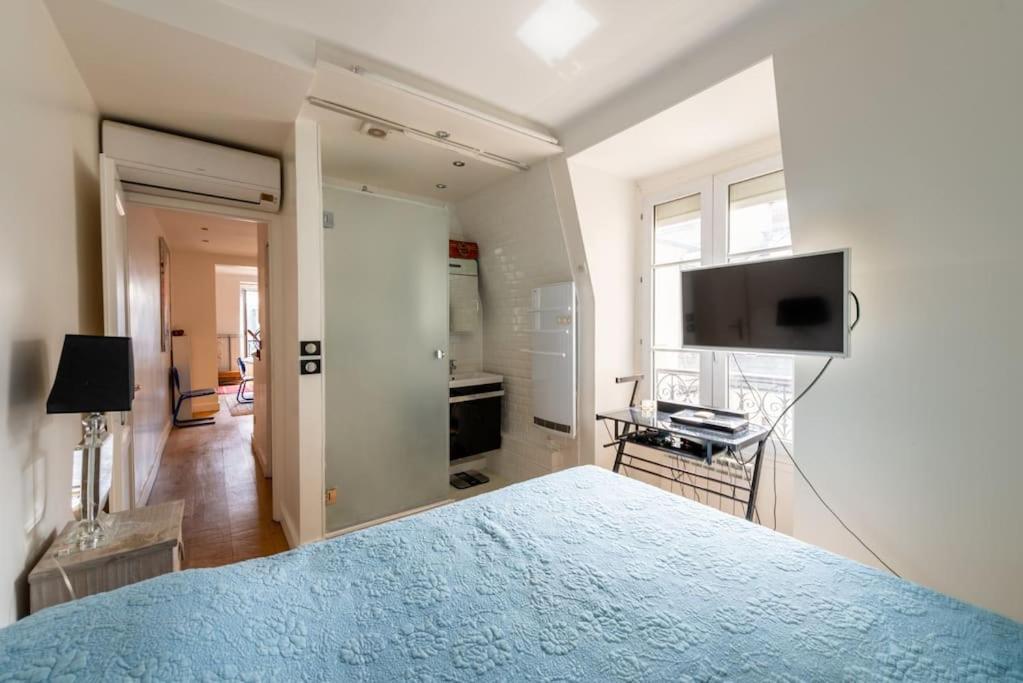 Appartement Vue Tour Eiffel ปารีส ภายนอก รูปภาพ